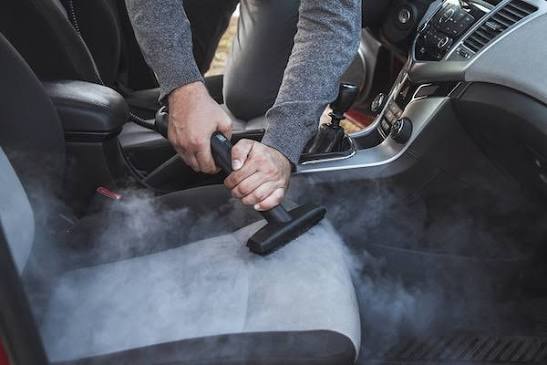 steam cleaning car